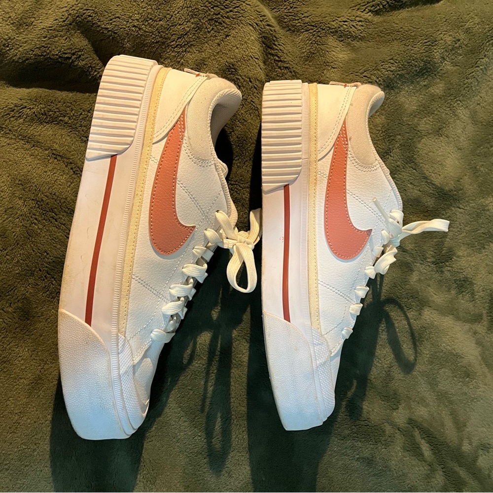 Nike Pink and Cream Sneakers with Unique Sole and Breathable Texture